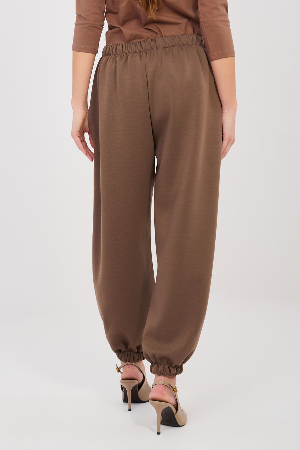 Pleated elastic trousers