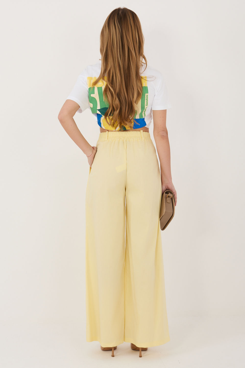 Green pleated trousers