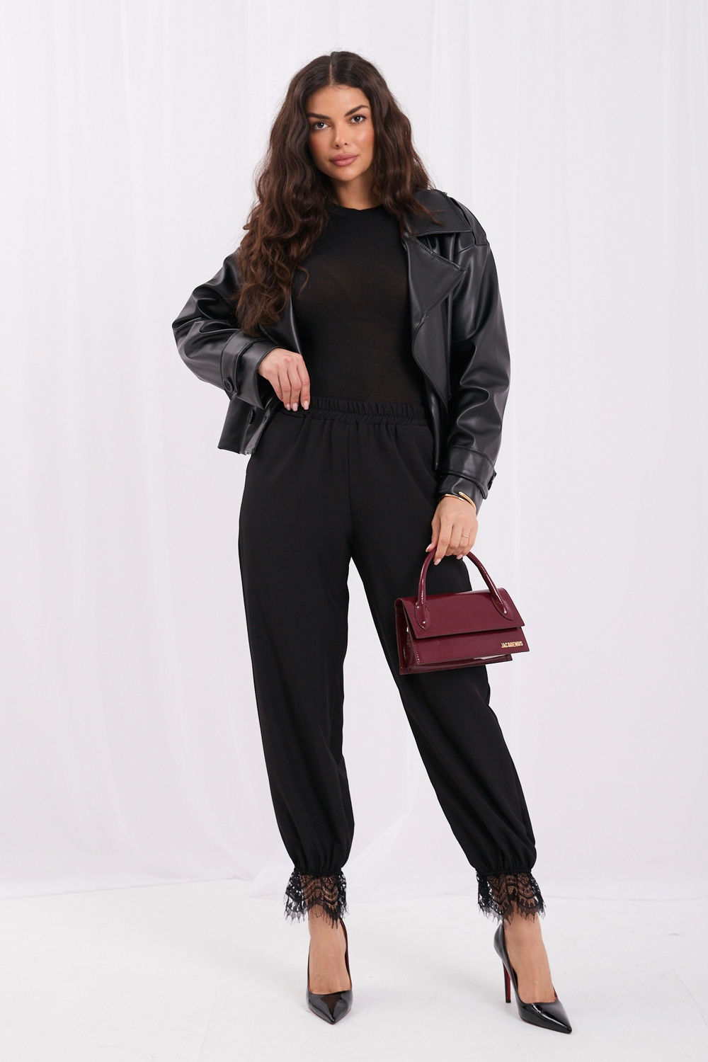 Black high-waisted lace trousers