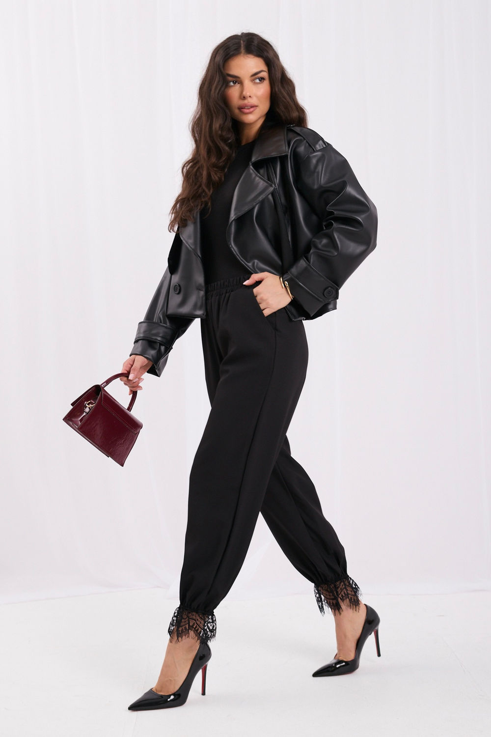 Black high-waisted lace trousers