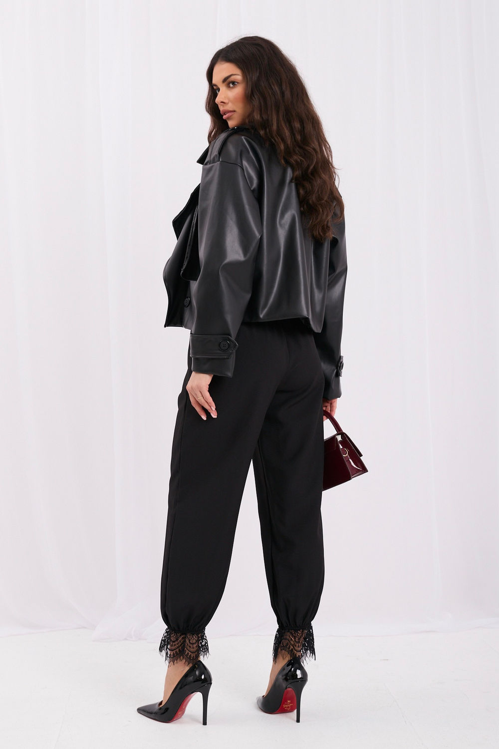 Black high-waisted lace trousers