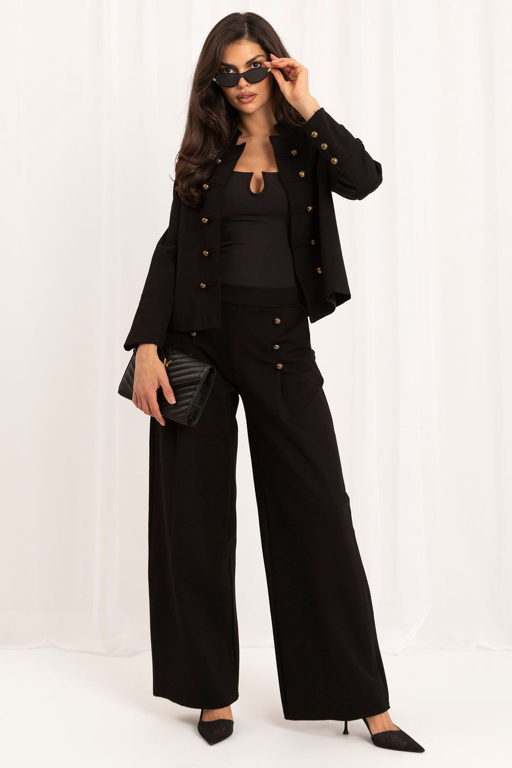 Black buttoned elastic trousers
