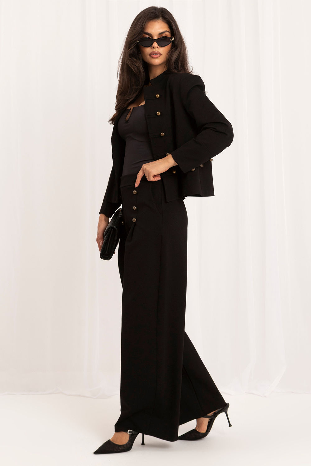 Black buttoned elastic trousers