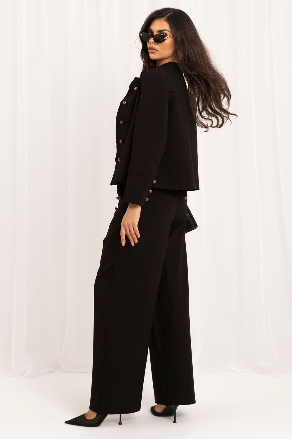 Black buttoned elastic trousers