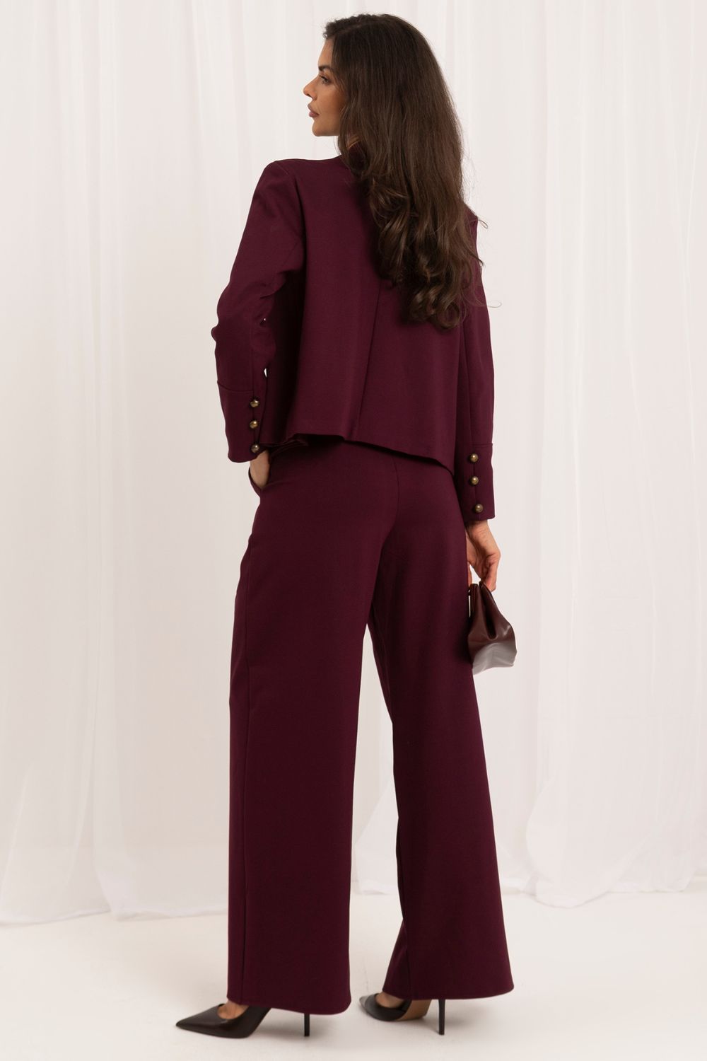 Black buttoned elastic trousers