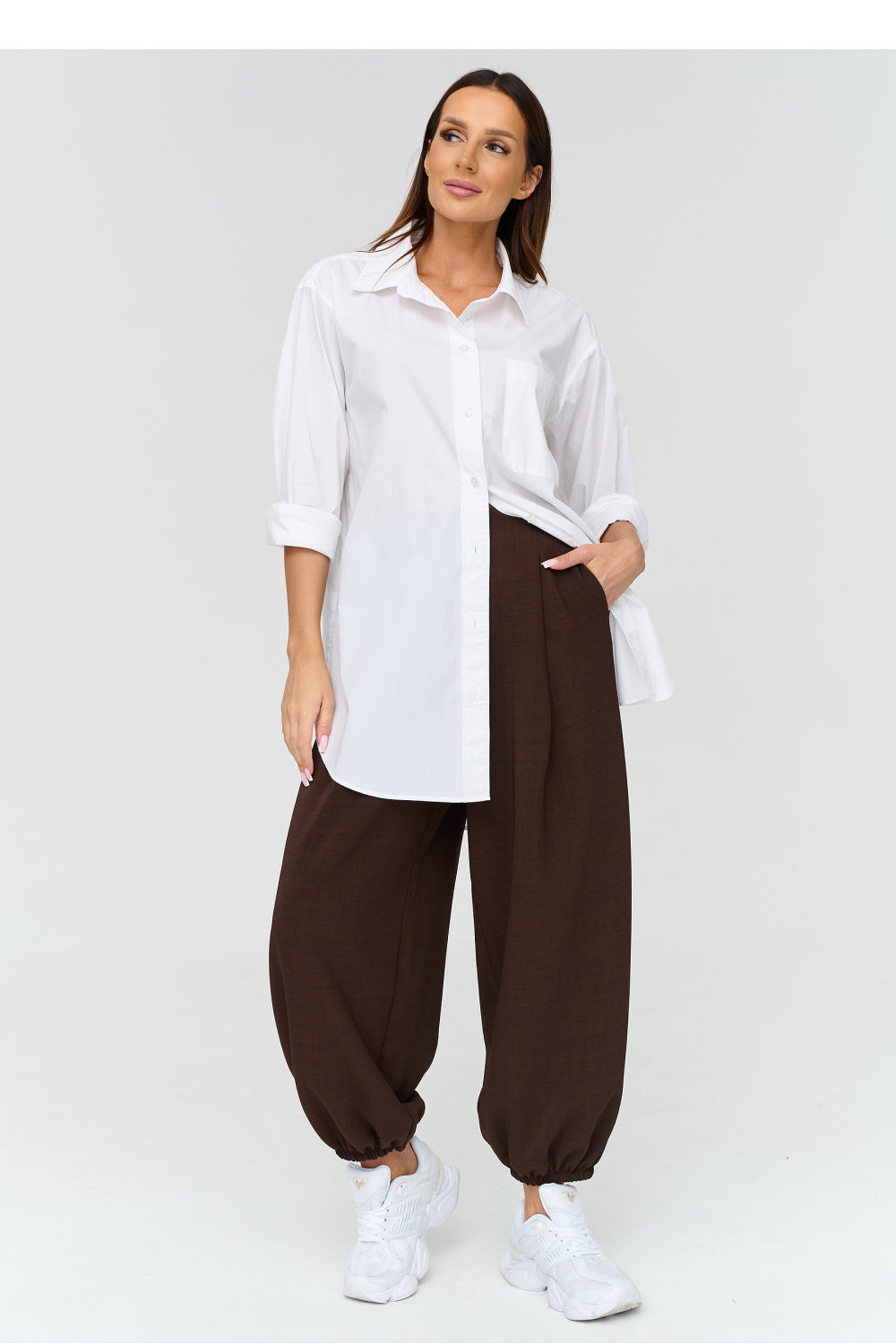 Buttoned elastic trousers