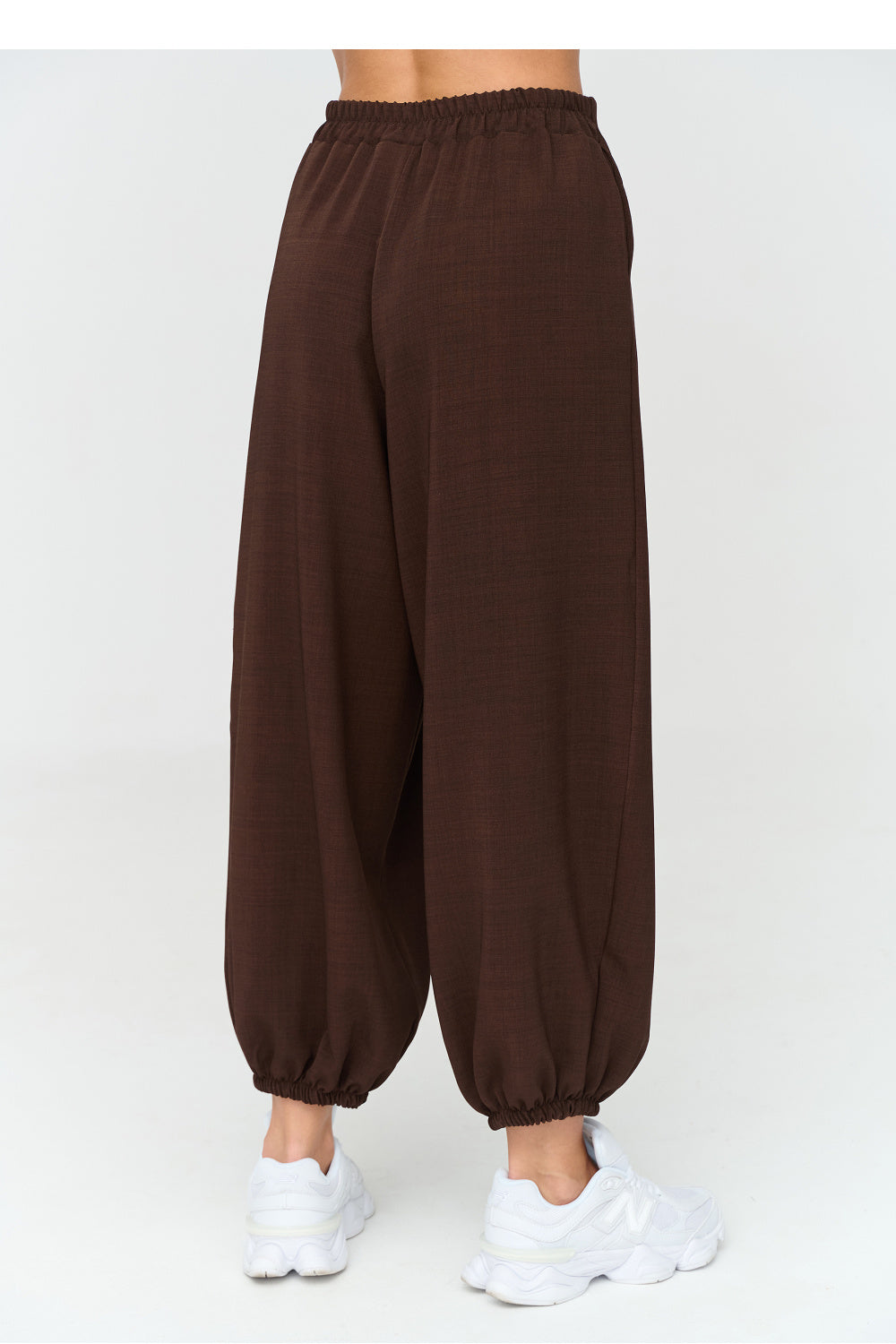 Buttoned elastic trousers