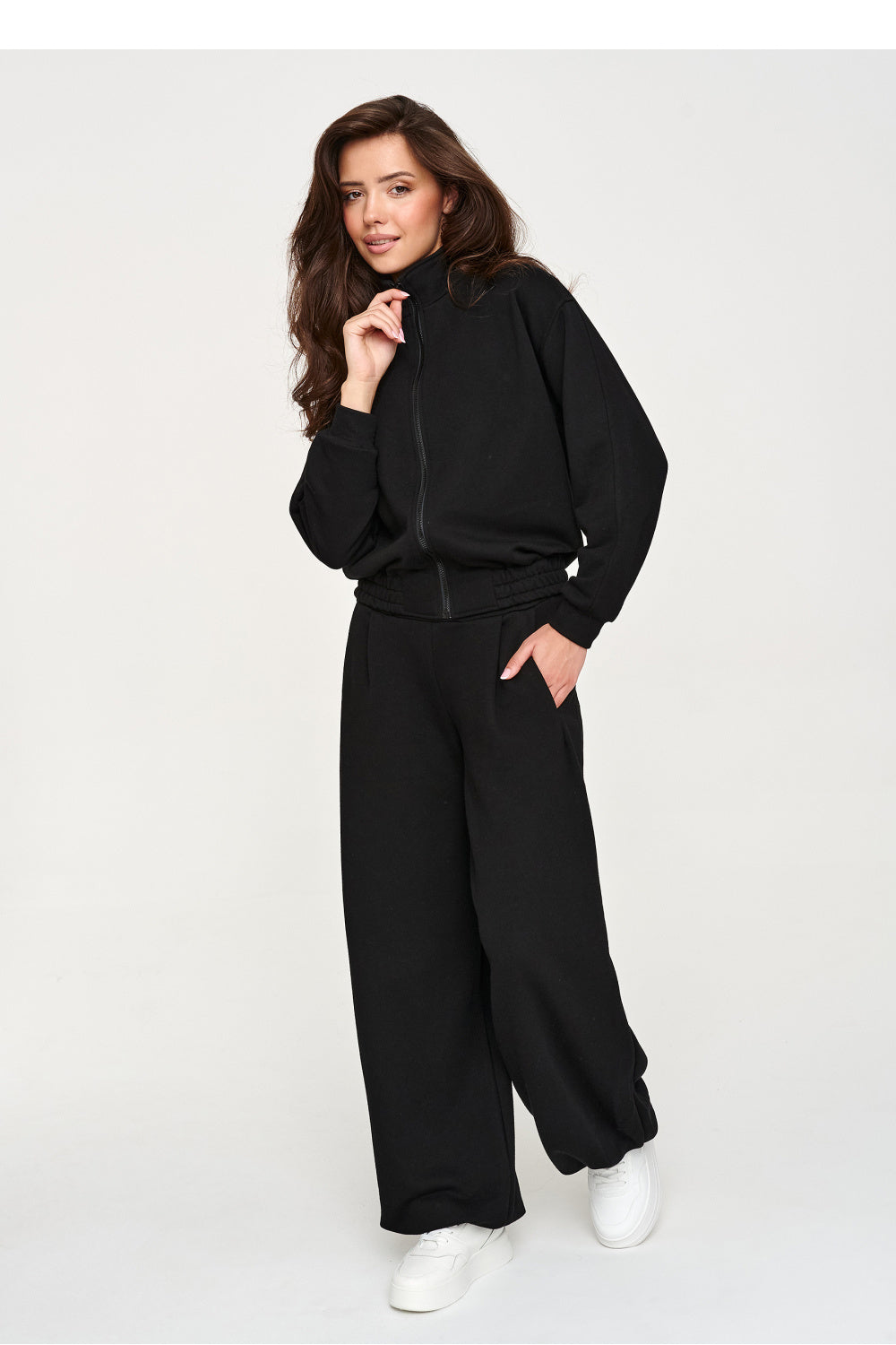 Black elastic-waist cotton trousers