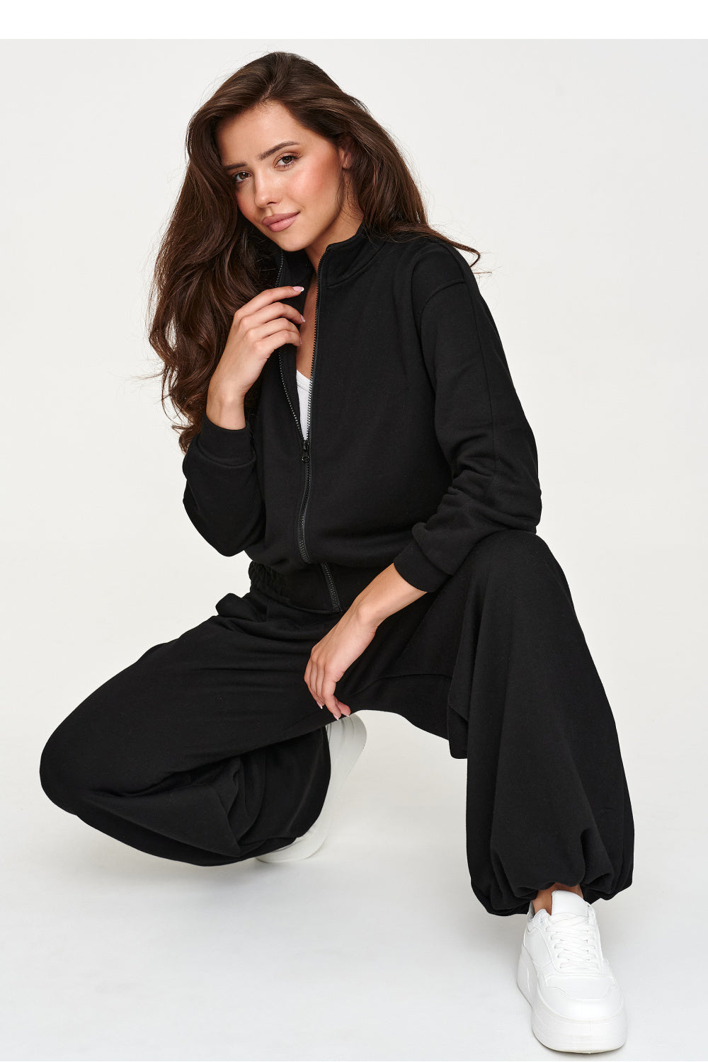 Black elastic-waist cotton trousers